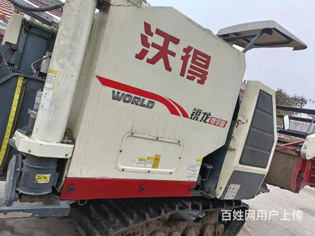 沃得双驱动收割机图片(沃得收割机2021款价格履带式)
